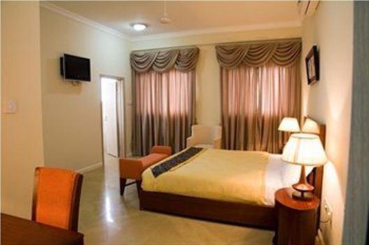 Royal Richester Hotel Acra Quarto foto